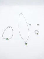 The Petite Acorn Collection with earrings and pandet and bracelet and ring