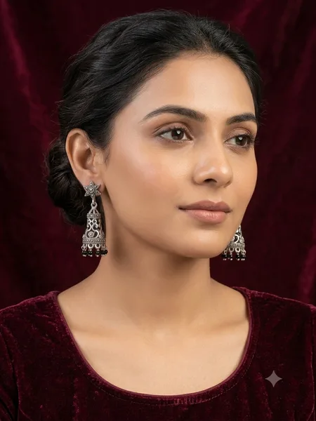handcrafted oxidized silver jhumka earrings.