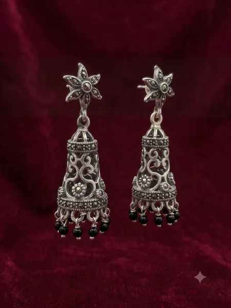 handcrafted oxidized silver jhumka earrings.