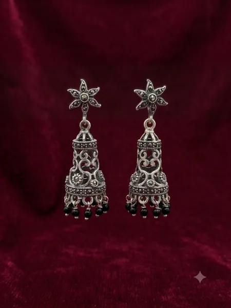 handcrafted oxidized silver jhumka earrings.