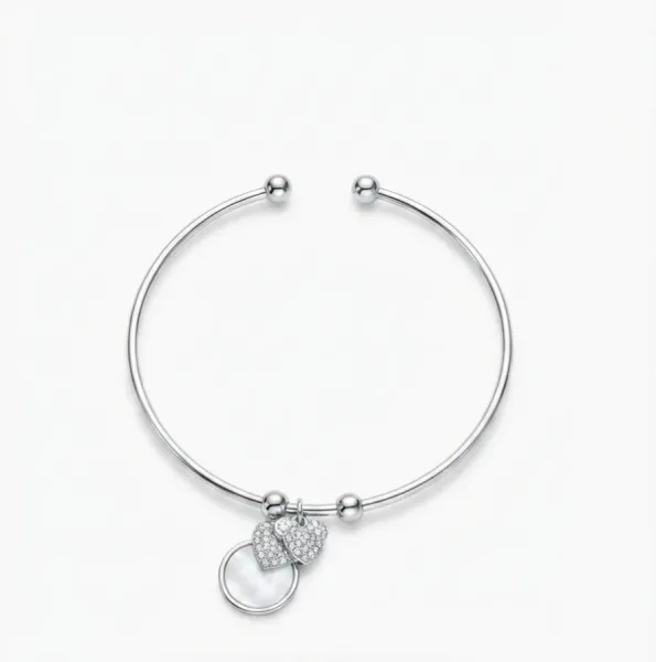 Celeste Twin Hearts Charm Bangle