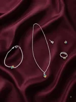 The Petite Acorn Collection with earrings and pandet and bracelet and ring