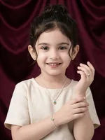 The Petite Acorn Collection with earrings and pandet and bracelet and ring